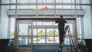 Technician check for automatic swing door faults to prevent sudden failure